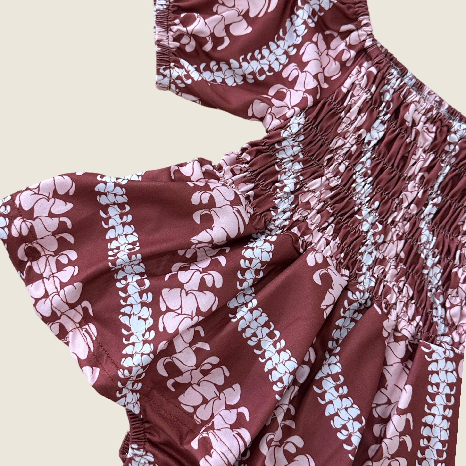 Brick Puakenikeni Lei Sleeved Melody Romper - Sweet Sweet Honey Hawaii