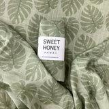 Green Monstera Swaddle Blanket - Sweet Sweet Honey Hawaii